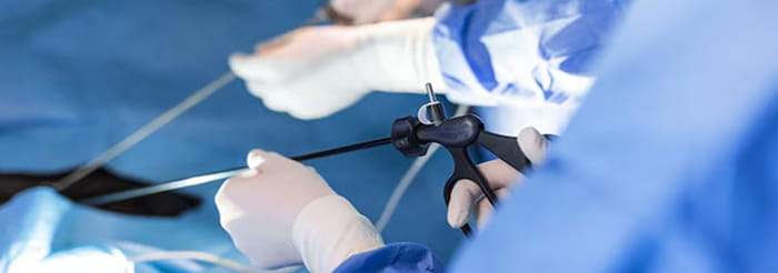 Doctor performing minimally invasive interventional treatment for lung cancer